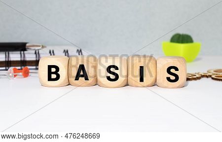 White Tile Alphabet Letter With Word Basis On Wood Background