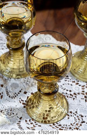 Antique German Glassware, Old Dutch Style Rummer Or Roemer Glasses With White Wine On White Lace Tab
