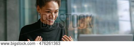 Smiling Woman Freelance Talking With Client Via Video Call And Discuss Project Sitting In Cafe