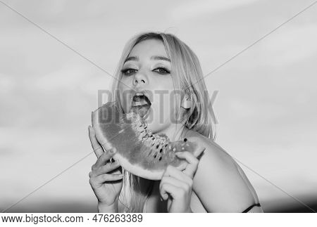 Sexy Girl Eating A Watermelon. Blonde Young Woman Model With Bright Makeup And Red Lips. Summer Sexy