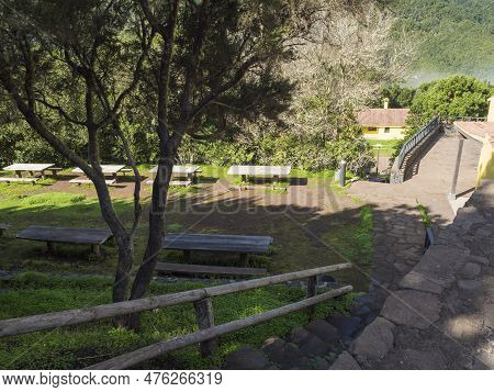 Picnic Resting Area With Bench And Tables In Mist Laurisilva Forest At The Garajonay National Park H