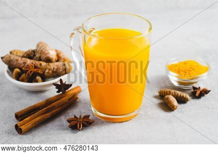 Turmeric Tea, Healthy Beverage With Turmeric Root And Spices, Jamu Juice, Immunity Booster Drink On