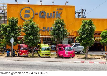 Thailand, Patong - 03.27.23: Small Japanese Trucks Converted Into Taxis For Tourists Called Tuk Tuk 
