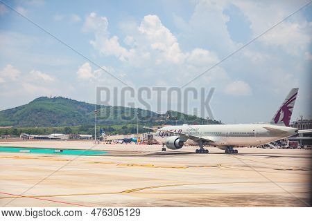 Passenger Aircraft Of Qatar Airline At The Airport Of Thailand, Phuket