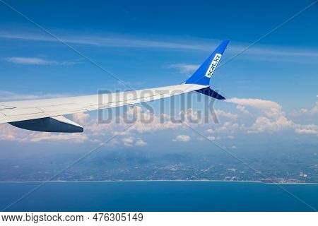 Thailand, Phuket - 04.05.23: View From The Window Of The Plane On The Wing Of The Scat Airline Of Ka