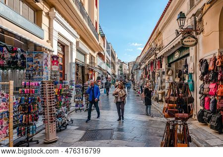 Athens, Greece - January 7 2023: Adrianou St In Plaka, A Busy Pedestrian St, With Shops And Sidewalk