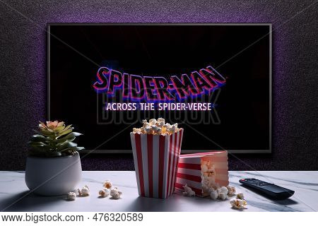 Tv Screen Playing Spider-man Across The Spider-verse Trailer Or Movie. Tv With Remote Control, Popco
