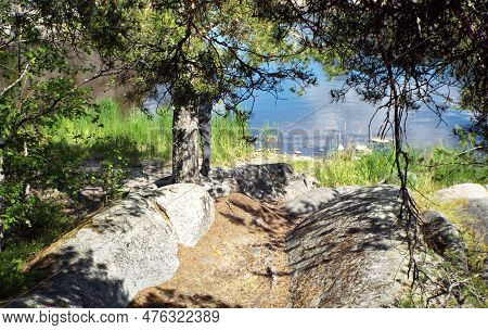 Scenery. Russia. Karelia. Karelian Skerries. Lake Ladoga. Channel Of Lake Ladoga With Stony Banks. N