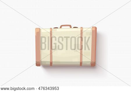 A Bright Biege Suitcase Lying On White