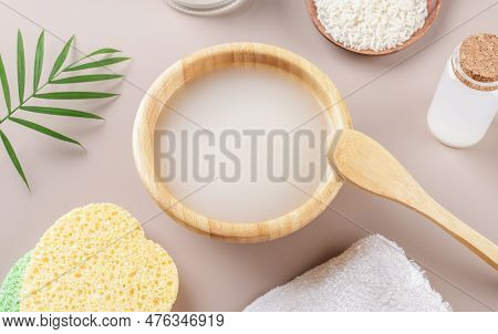 Homemade Cosmetic Rice Water With Ingredients On Beige Background, Healthy Beauty Treatment Ingredie