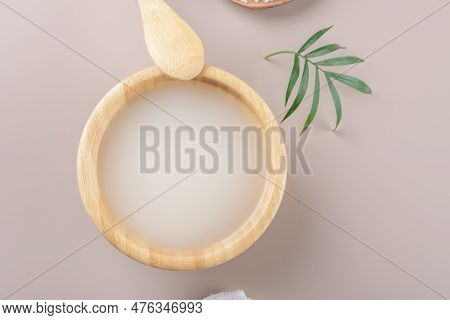 Homemade Cosmetic Rice Water With Ingredients On Beige Background, Healthy Beauty Treatment Ingredie