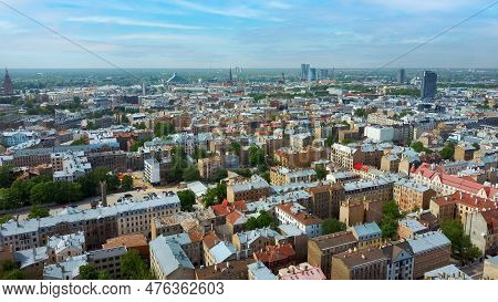 Riga Cityscape Spring Aerial Top View Video, Town, Latvia. Sunny Day Building Rooftops. Riga Skyline