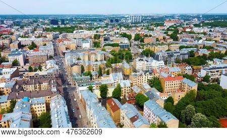 Riga Cityscape Spring Aerial Top View Video, Town, Latvia. Sunny Day Building Rooftops. Riga Skyline