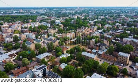 Riga Cityscape Spring Aerial Top View Video, Town, Latvia. Sunny Day Building Rooftops. Riga Skyline