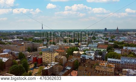 Riga Cityscape Spring Aerial Top View Video, Town, Latvia. Sunny Day Building Rooftops. Riga Skyline
