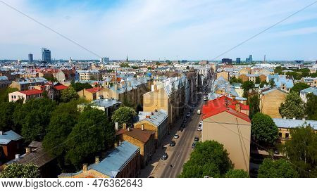 Riga Cityscape Spring Aerial Top View Video, Town, Latvia. Sunny Day Building Rooftops. Riga Skyline