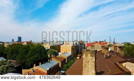 Riga Cityscape Spring Aerial Top View Video, Town, Latvia. Sunny Day Building Rooftops. Riga Skyline