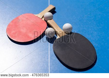 Tabletennis Or Ping Pong Rackets And Balls On Table. Sport Concept.