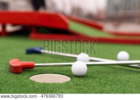 Mini Golf Close-up, Colorful Golf Putters, Balls