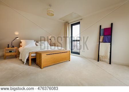 Cambridge, Cambridgeshire, England - Jan 26 2015: Luxury Modern Furnished Bedroom With Wooden Bed, L