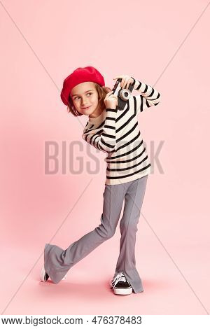 Portrait Of Curious Little Girl, Cild In Striped Sweater And Red Beret Posing With Vintage Photo Cam