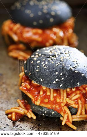Close Up Of Charcoal Bun Spaghetti Sandwich