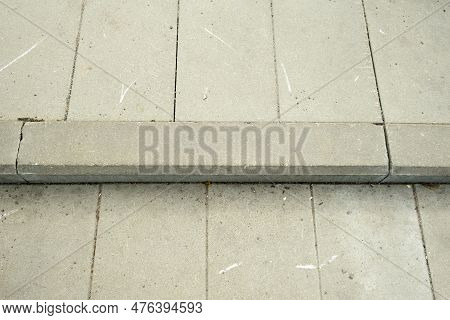 Grey Tiles For The Steps, With A Bardur Stone.. Gray Background And A Place For The Inscription.