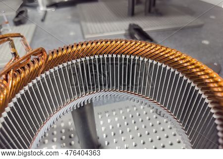 Close Up Scene The Electric Car Motor Stator Part. The Electric Vehicle Parts Manufacturing Concept.