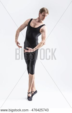 One Tranquil Contemporary Ballet Dancer Flexible Athletic Man Posing In Black Tights In Ballanced Da