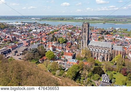 Aerial From The City Zaltbommel With The St. Martin Church In The Netherlands