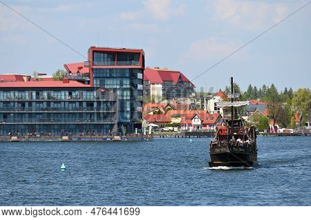 Mikolajki, Poland, May 14: View To City From The Lake On May 14, 2023 At Mikolajki, Poland. Mikolajk