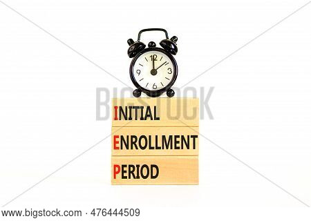 Iep Symbol. Concept Words Iep Initial Enrollment Period On Beautiful Wooden Block. Black Alarm Clock