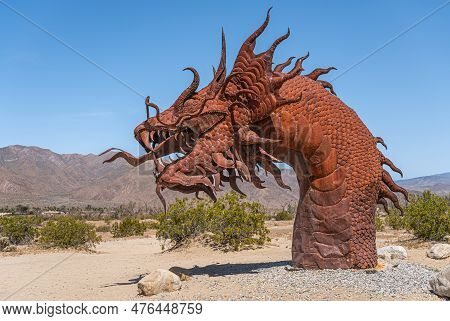 Borrego Springs, Ca, Usa - April 24, 2023: Brown Rusted Metal Prehistoric Giant Snake Dinosaur Statu