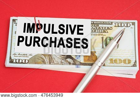Business Concept. On A Red Surface Are Dollars On Which A Pen And Paper With The Inscription - Impul