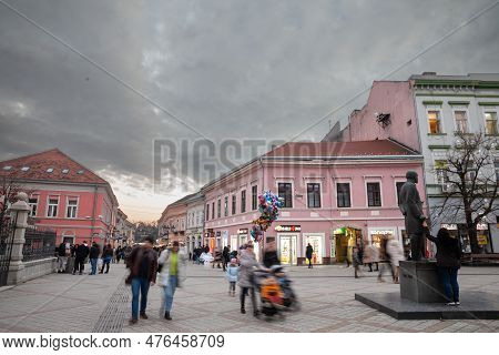 Novi Sad, Serbia - October 15, 2022: Selective Blur On Dunavska Ulica Street At Dusk, A Pedestrian S