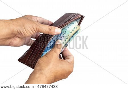 Taking Out Some Currency Notes From A Wallet On Isolated White Background