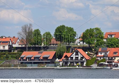 Mikolajki, Poland, May 14: View To City From The Lake On May 14, 2023 At Mikolajki, Poland. Mikolajk