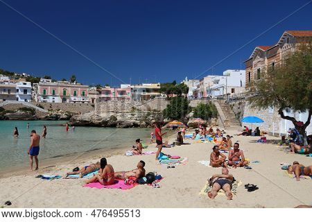 Apulia, Italy - May 30, 2017: Beachgoers Visit Santa Maria Al Bagno Beach In Puglia Region, Italy. W