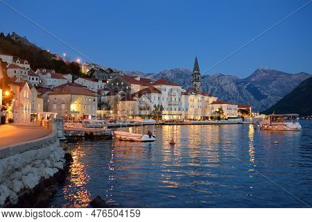 View Of Ancient Picturesque City Of Perast. Old Medieval Little Town With Red Roofs And Mountains On