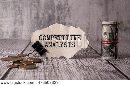 Business Concept. On The Business Charts Is A Pen And A Sign With The Inscription - Competitor Analy