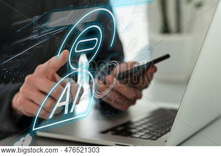 Man Using Laptop Or Smartphone With Chat With Ai, Artificial Intelligence, System Artificial Intelli
