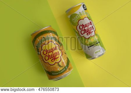 May 18, 2022 Ukraine City Kyiv Drink Chupa Chups On A Colored Background