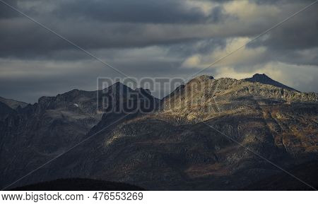 Dramatic Light And Clouds Over Mountain Peaks Of Northern Norway, Landscape And Nature Of Arctic Sca