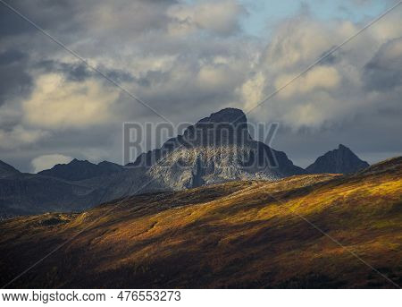 Dramatic Light And Clouds Over Mountain Peaks Of Northern Norway, Landscape And Nature Of Arctic Sca