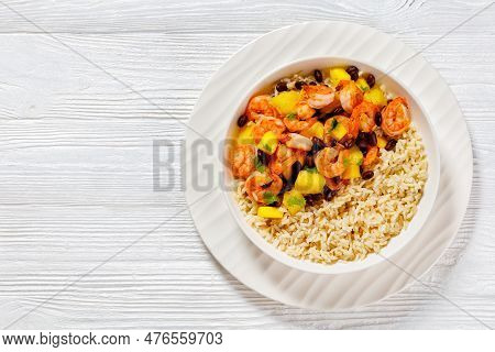 Caribbean Grilled Shrimps With Black Beans, Mango Pineapple Salsa Served With Brown Rice In White Bo