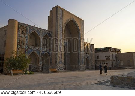 Bukhara, Uzbekistan - September 09, 2022: Early Sunny Morning At The Ancient Mirzo Ulugbek Madrasah