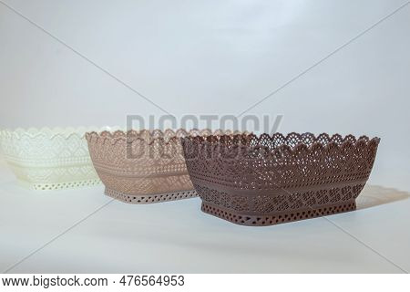 White, Cream, And Brown Plastic Box Basket