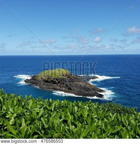 Island In Kauai Surrounded By With Blue Pacifis Ocean