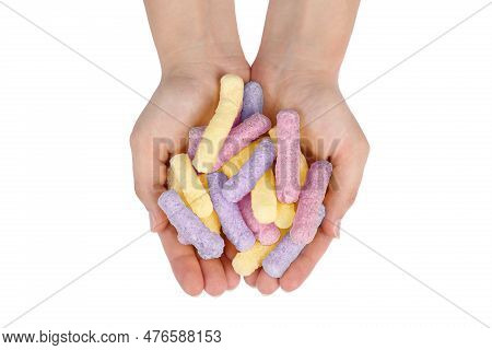 Woman Holding Colorful Corn Puffs On White Background, Top View