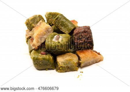 Turkish Pistachio Baklava Isolated On A White Background. A Variety Of Turkish Sweet Baklava. Walnut